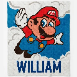 Super Mario personalized blanket with name William, C2C crochet pattern design, flying Mario on blue sky background with clouds, white border, baby boy blanket concept