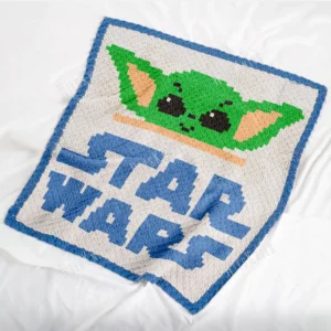 Crochet blanket featuring Grogu Baby Yoda and text Star Wars