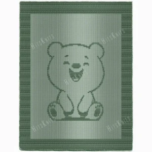 Green knitted blanket with a textured cute smiling teddy bear, created using knit and purl stitches, with a garter stitch border and smooth stockinette center.