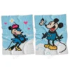 C2C crochet blankets featuring Mickey and Minnie Mouse from a Disney cartoon, two pixel-style blanket designs on blue background with clouds, corner to corner crochet pattern set