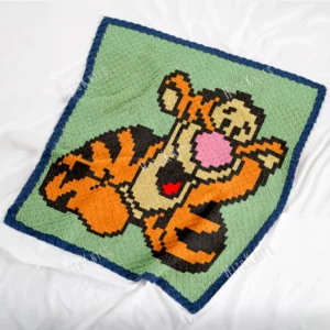 Tigger C2C blanket crochet pattern featuring the playful tiger from Disney Winnie the Pooh stories in a lively, relaxed pose.