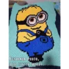 Minion Dave full-body C2C crochet blanket in baby blue background, yellow character with silver goggles and blue overalls, pixel-style design, cute handmade baby blanket