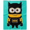 Minion in Batman-style costume C2C crochet blanket on teal background, close-up design with mask, cape, and chest emblem, pixel-style handmade blanket
