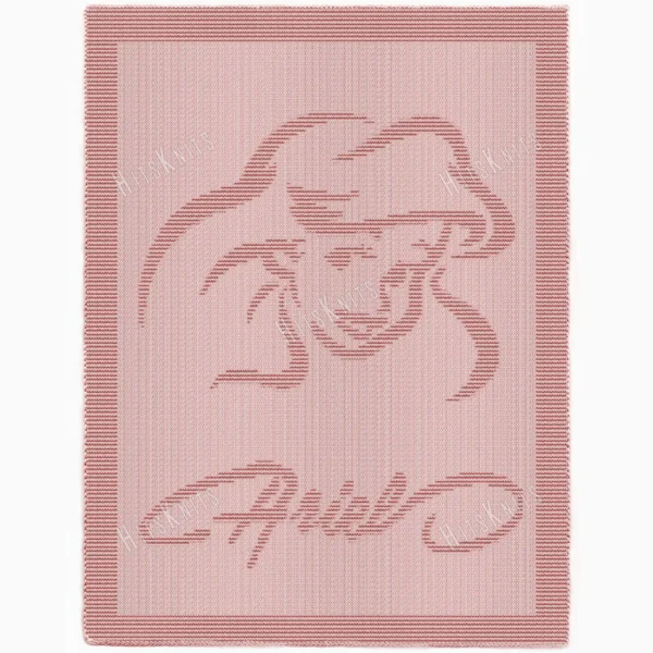 Soft pink knitted baby blanket featuring a portrait of Ariel from Disney’s The Little Mermaid, with her name elegantly knitted into the design. Textured reversible stitch pattern with decorative border, perfect for girls, toddlers, and kids who love magical mermaid themes.