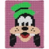 Goofy finger knitting blanket pattern made with chunky chenille yarn, featuring Disney’s funny dog character Goofy with his classic green hat on a soft pink background, cozy handmade jumbo yarn blanket design for kids, nurseries, and Disney lovers.