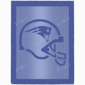 Knitted blanket featuring a football helmet motif inspired by the New England Patriots, worked in garter stitch against a stockinette background. The blanket has a textured border framing the helmet design. The helmet is shown in a side profile with a face mask and team-inspired details, suitable for football fans, teens, and adults.