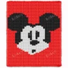 Mickey Mouse chunky knit blanket with classic black ears and white face on a bright red background, made in a pixel-style colorwork design using chunky chenille yarn. Cozy handmade blanket inspired by vintage cartoon characters and retro animation décor, suitable for nurseries, kids’ rooms, playrooms, and Disney-inspired interiors.
