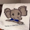 Elephant Finger Blanket knitting pattern by HitsKnits - kawaii-style graphghan in white, grey, and blue jumbo yarn
