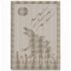 Minimalist knitted blanket featuring a giant Godzilla silhouette towering over a modern city skyline beneath a full moon and lightning bolts. The blanket is worked in a single neutral color with textured garter stitch motifs on a smooth stockinette background, framed by a wide garter stitch border. Perfect for monster movie fans, kids’ rooms, gaming spaces, and cozy modern interiors.