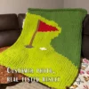 Golf-themed chunky knit blanket pattern featuring a green putting course with a red golf flag, golf hole, and white golf ball. The design is worked in chunky chenille-style stitches with bold shades of green, creating a soft and cozy sporty blanket perfect for golf lovers, boys’ rooms, game rooms, man caves, and handmade gifts.