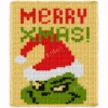 Grinch Xmas chunky knit blanket pattern featuring the Grinch in a red Santa hat with Merry Xmas lettering, set against a cream background, knitted in jumbo yarn using finger knitting colorwork technique.