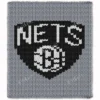 Chunky knitted blanket featuring the Brooklyn Nets basketball logo in black and white on a gray background. Cozy chenille-style graphghan design with bold sporty lettering and a basketball shield emblem inspired by professional basketball team décor.