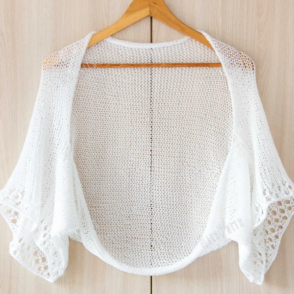 Cotton Lace Shrug knitting pattern by HitsKnits - lightweight open summer shrug in white fingering cotton yarn with lace border