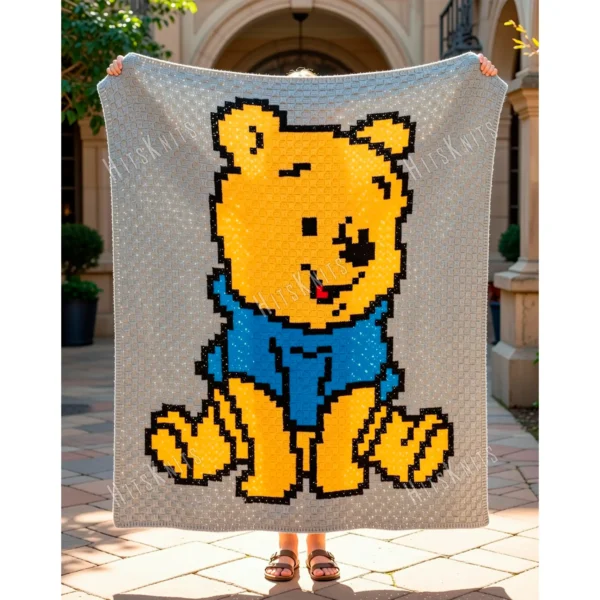 Winnie the Pooh C2C crochet blanket pattern featuring classic Pooh Bear in a blue shirt on a warm neutral background, handmade pixel graphghan blanket design.