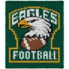 Eagles Football Finger Knit Blanket Pattern - an Eagles football team crest with an eagle head and football inside a gold badge on green, worked in stockinette colorwork intarsia with 6 colors: Green, White, Gold, Black, Brown, Gray.