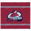 Colorado Avalanche Finger Knit Blanket Pattern - white avalanche mountain logo outlined in blue with a black puck on a burgundy background with blue and white stripes, worked in stockinette colorwork intarsia with 4 colors: Red, White, Blue, Black.