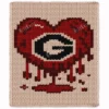 Georgia Heart Finger Blanket Pattern - bold graphic heart with kawaii eye in Cream, Red, Burgundy, and Black, worked in stockinette colorwork intarsia with sweeping color sections on a cream background.