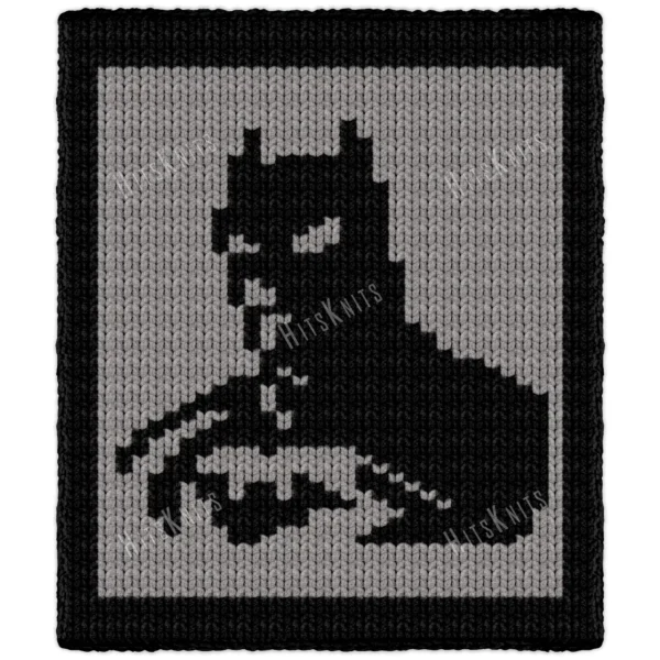 Batman Finger Knit Blanket Pattern - bold Batman silhouette with cape and cowl standing beside the Batmobile, worked in stockinette colorwork intarsia with 2 colors: Gray and Black.