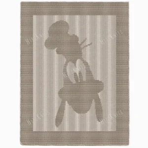 Goofy Blanket Knitting Pattern showing a silhouette of Disney's Goofy in his hat, with long ears and big eyes, in raised knit and purl texture on a knitted blanket with a garter stitch border, worked in one solid color, 182 stitches x 322 rows.