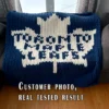 Toronto Maple Leafs Finger Knit Blanket Pattern - white maple leaf logo and team name on royal blue background, worked in stockinette colorwork intarsia with 2 colors: Royal Blue and White.