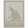 Godzilla City Blanket Knitting Pattern showing a textured silhouette of Godzilla towering above a city skyline with skyscrapers, worked in one solid colour using knit and purl stitches with a garter stitch border, 175 stitches × 341 rows.