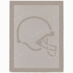 Football Helmet Blanket Knitting Pattern showing a textured silhouette of an American football helmet with a face mask, on a solid single-colour blanket with a garter stitch border, worked in one colour, 220 stitches x 396 rows.