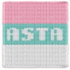 ASTA Baby Finger Knitting Blanket Pattern showing the name ASTA in white block letters on a sage band, with pink and white bands, a soft nursery mood, worked in stockinette colorwork intarsia with 3 colors: White, Pink, and Sage.