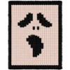 Ghost Chunky Blanket Loom Knitting Pattern showing a black scream mask silhouette with hollow eyes and an open mouth on a solid background, worked in colorwork with 2 colors: Background and Black.