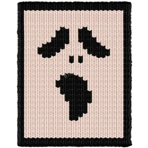 Ghost Chunky Blanket Loom Knitting Pattern showing a black scream mask silhouette with hollow eyes and an open mouth on a solid background, worked in colorwork with 2 colors: Background and Black.