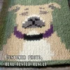 Pit Bull Dog Finger Knitting Blanket Pattern showing a cute front-facing pit bull dog with a beige face, ivory muzzle, gray nose patch, black nose and open mouth, and pink cheeks on an olive green background, worked in stockinette colorwork intarsia with 6 colors: Olive, Beige, Ivory, Gray, Black, and Pink.