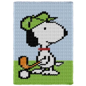 Snoopy Golfing Finger Knit Blanket Pattern showing a white beagle in a lime green golf visor and red collar mid-swing with a golf club and orange club head, on lime green grass against a sky blue background, worked in stockinette colorwork with 6 colors: Sky, Lime, White, Black, Orange, and Red.