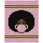 Bubblegum Blanket Finger Knitting Pattern - a girl with a big black afro blowing a pink bubblegum bubble, gold hoop earrings and brown skin on a pink background with gold and black stripes, worked in stockinette colorwork intarsia with 5 colors: Pink, Black, Gold, Camel, White.