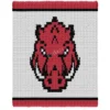 Arkansas Razorbacks Knit Chunky Blanket Pattern - a bold red razorback hog with a black outline and tusks on a white background with a red and black striped border, worked in stockinette colorwork intarsia with 3 colors: Red, Black, and White.