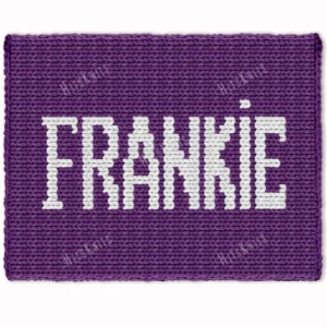 Frankie Chunky Blanket Knitting Pattern showing the name Frankie in crisp white block letters running along the length of a deep purple blanket, worked in stockinette colorwork intarsia with 2 colors: Purple and White.