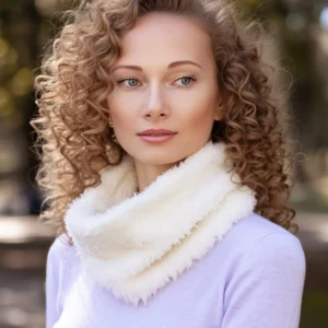 Free Easy Neck Warmer Knitting Pattern showing a soft cream white faux fur cowl worn close around the neck, knitted flat in garter stitch on 8 mm needles in one solid colour and seamed into a tube.