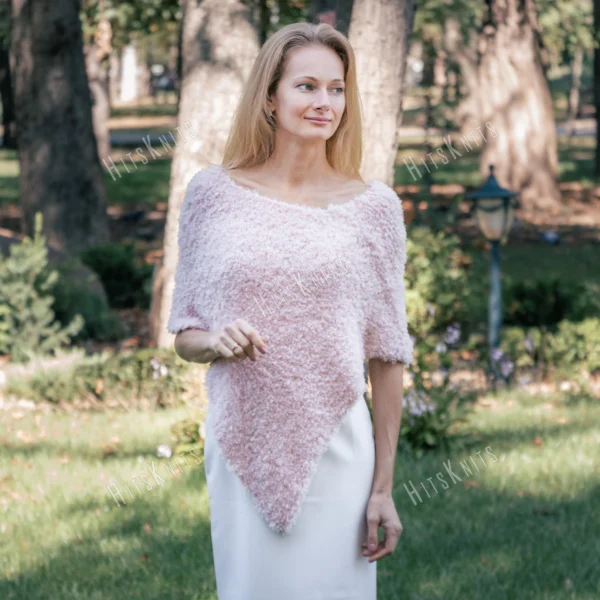 Free Faux Fur Wedding Poncho Knitting Pattern showing a soft white fluffy triangular poncho draped over the shoulders with a long front point, worked in garter stitch, one size fitting S, M, and L.