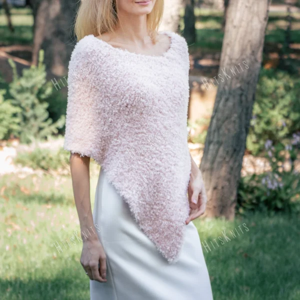Free Faux Fur Wedding Poncho Knitting Pattern showing a soft white fluffy triangular poncho draped over the shoulders with a long front point, worked in garter stitch, one size fitting S, M, and L.