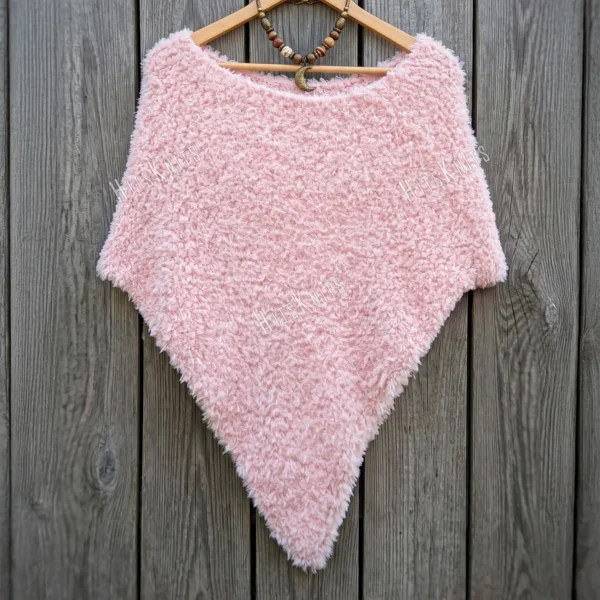 Free Faux Fur Wedding Poncho Knitting Pattern showing a soft white fluffy triangular poncho draped over the shoulders with a long front point, worked in garter stitch, one size fitting S, M, and L.