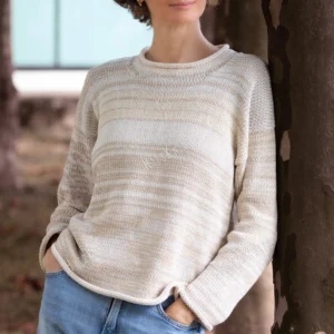 Cozy Women's Basic Sweater Knitting Pattern showing a relaxed drop-shoulder pullover in marled cream, oat, and sand, worked in stockinette stitch with rolled hem, cuffs, and neckline, sizes S to 2XL.