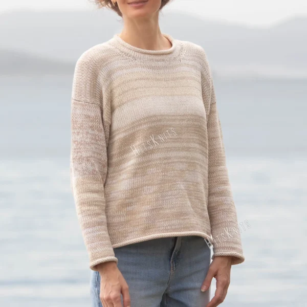 Cozy Women's Basic Sweater Knitting Pattern showing a relaxed drop-shoulder pullover in marled cream, oat, and sand, worked in stockinette stitch with rolled hem, cuffs, and neckline, sizes S to 2XL.