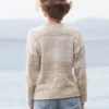 Cozy Women's Basic Sweater Knitting Pattern showing a relaxed drop-shoulder pullover in marled cream, oat, and sand, worked in stockinette stitch with rolled hem, cuffs, and neckline, sizes S to 2XL.