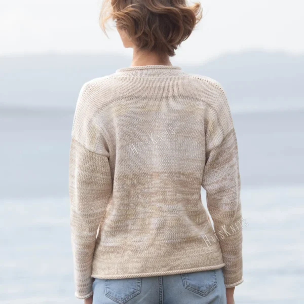 Cozy Women's Basic Sweater Knitting Pattern showing a relaxed drop-shoulder pullover in marled cream, oat, and sand, worked in stockinette stitch with rolled hem, cuffs, and neckline, sizes S to 2XL.