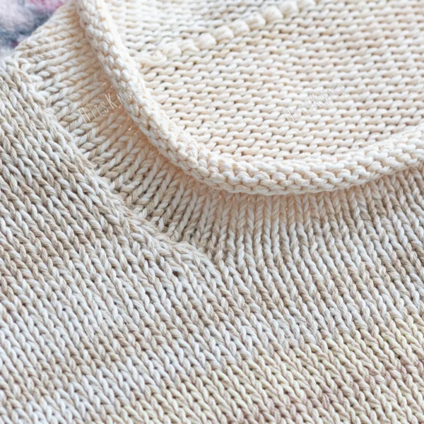 Cozy Women's Basic Sweater Knitting Pattern showing a relaxed drop-shoulder pullover in marled cream, oat, and sand, worked in stockinette stitch with rolled hem, cuffs, and neckline, sizes S to 2XL.
