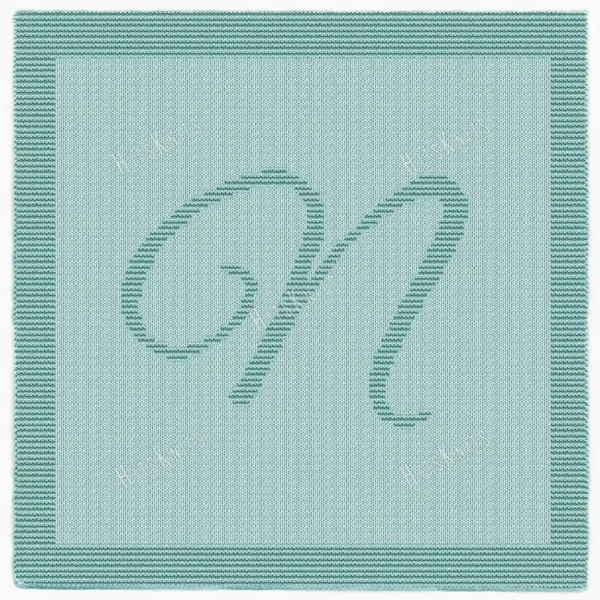 Free Calligraphy Letter N Blanket Knitting Pattern showing a textured calligraphic capital letter N in raised relief at the centre of a solid single-colour blanket with a garter stitch border, worked in one colour, 140 stitches x 210 rows.