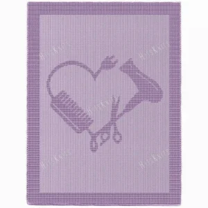 Hair Stylist Heart Blanket Knitting Pattern showing a textured silhouette of a hair dryer, comb, and scissors forming a heart, on a solid single-color blanket with a garter stitch border, worked in one color, 220 stitches x 396 rows.