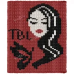 Red Lips Lady Chunky Knit Blanket Pattern showing a long-haired woman with bold red lips and a butterfly beside her, with the initials TBL, worked in stockinette colorwork with 3 colors: Red, Black, and Ivory.