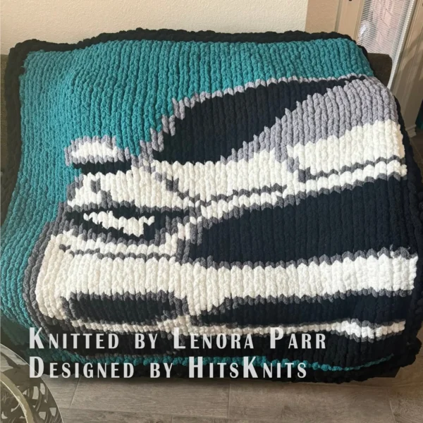White Mustang Finger Knit Blanket Pattern - white front-view muscle car on a blue field, 4-color colorwork in black, white and grey.