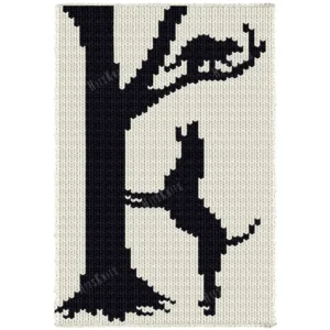 Hunting Dog Loom Knit Blanket Pattern - a black coonhound standing on its hind legs against a tall bare tree, head raised baying at a raccoon in the branches above, worked in stockinette colorwork with 2 colors: Ivory and Black.