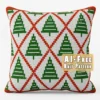 Christmas Tree Knit Pillow Panel Pattern - green Christmas trees in rows on a white ground framed by a red argyle lattice, worked in stockinette colorwork intarsia with 3 colors: white, red, green.