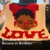 Love Yourself Finger Knit Blanket Pattern - motivational self-love portrait of an African American Black woman with an afro bun, a royal blue headband with a bow, blue glasses, gold hoop earrings and burgundy lips, above the word LOVE with floating hearts on a white background, knitted in stockinette colorwork intarsia with 8 colors: White, Royal Blue, Cornflower, Brown, Camel, Black, Gold, Burgundy.